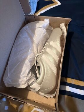 adidas Women's Athletic Sneaker in Metallic Silver and White with Tan Outsole